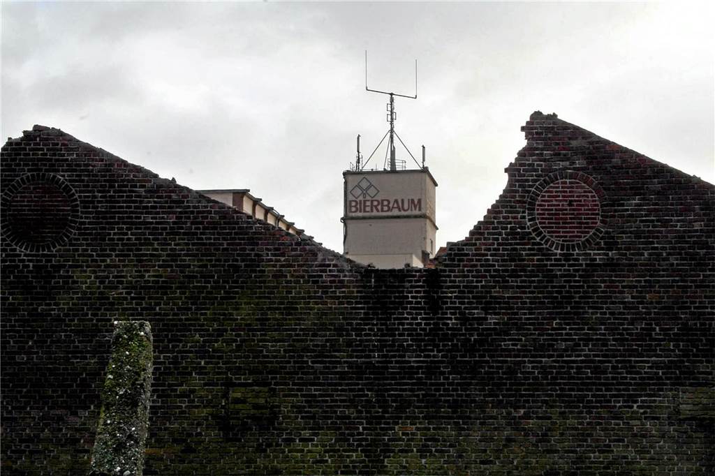 Einkaufen, Wohnen: Chronik der Industriebrache Bierbaum-Gelände Abriss der Sheddachgebäude im Jahr 2012