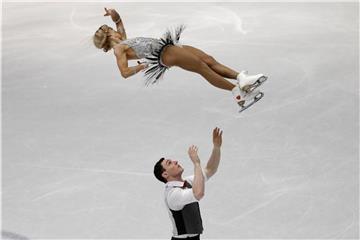 Aljona Savchenko und Bruno Massot lieferten in Mailand ein starkes Kurzprogramm ab. Foto: Luca Bruno/AP