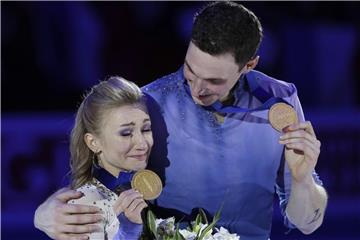Aljona Savchenko und Bruno Massot nehmen sich nach Olympia und WM eine kleine Auszeit um über die Zukunft nachzudenken. Foto: Luca Bruno/AP