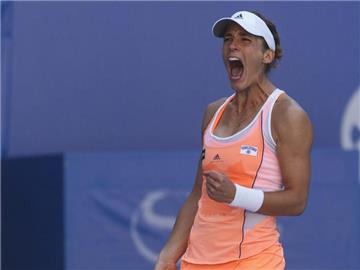 Andrea Petkovic ist die dritte deutsche Spielerin im Achtelfinale. Foto: Adrian Bradshaw