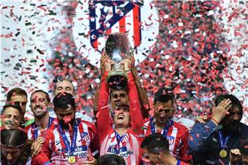 Antonie Griezmann (M) gewann mit Atlético Madrid die Europa League. Foto: Marius Becker