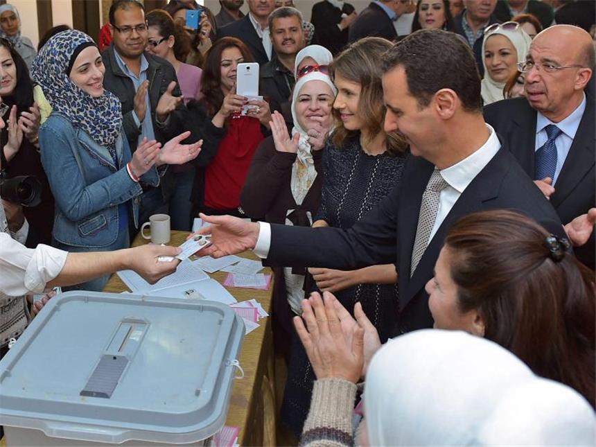Syriens Regime lässt trotz scharfer Kritik Parlament wählen Applaus für Assad. Foto: Sana