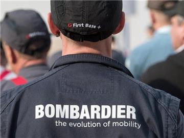Arbeiter von Bombardier Transportation auf einem Werksgelände in Sachsen. Foto: Patrick Pleul