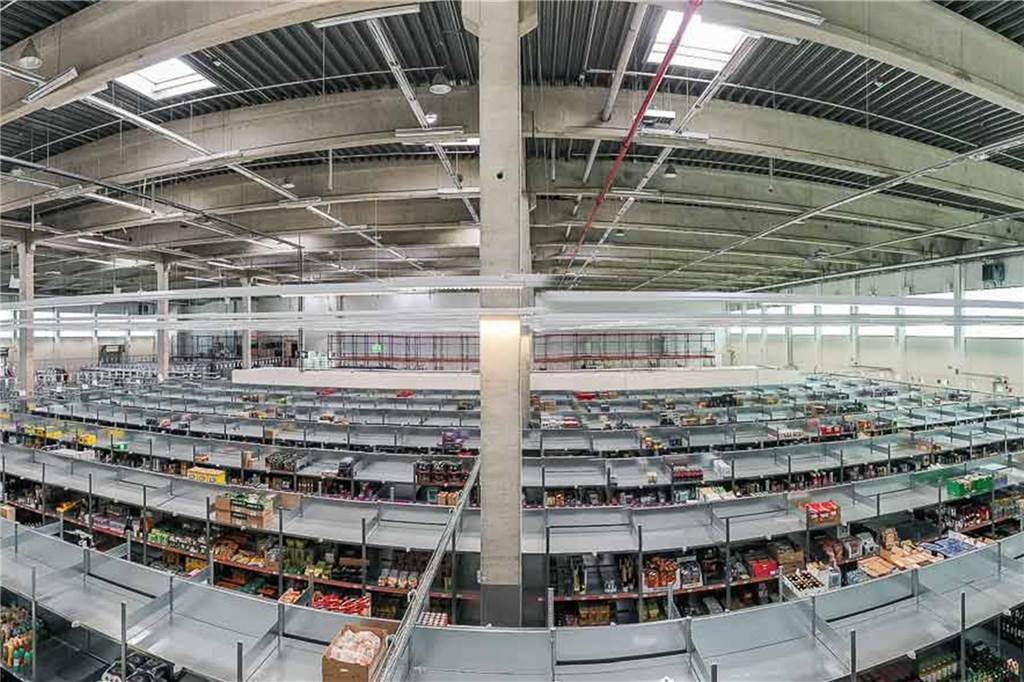 Rewe Lieferservice startet groß – aber nicht überall in der Stadt Auf 10.000 Quadratmetern lagern in Bochum-Wattenscheid im neuen Food Fulfillment Center Waren.