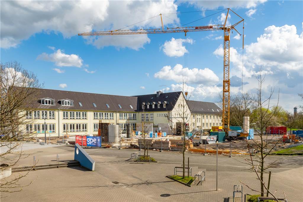 Anbau der Overbergschule geht voran: Stadt kündigt Ende der Bauarbeiten an Auf dem Gelände der Overbergschule in Selm wurde zuvor eine Turnhalle abgerissen. Nun entsteht ein Multifunktionsgebäude.