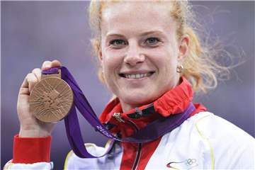 Aus Bronze wird Olympia-Silber: Hammerwerferin Betty Heidler. Foto: Christophe Karaba
