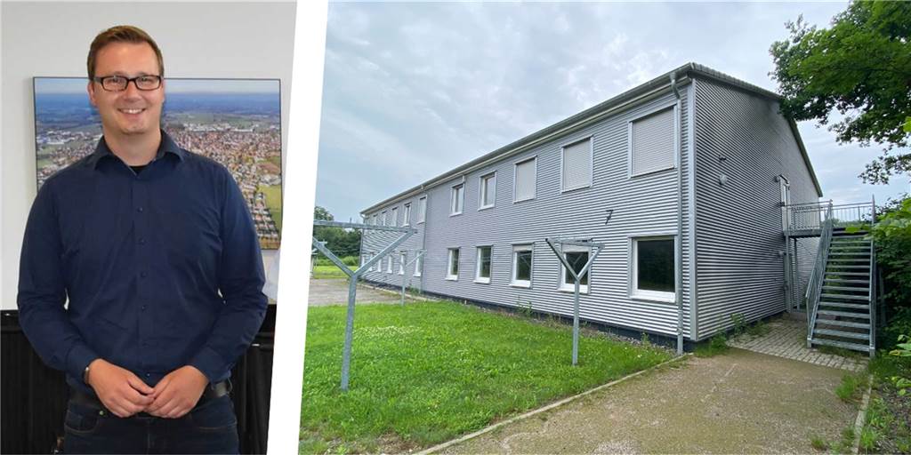 Brand in Geflüchtetenunterkunft - Verzögert sich nun der Wiedereinzug? Ein Mann steht neben einem Gebäude