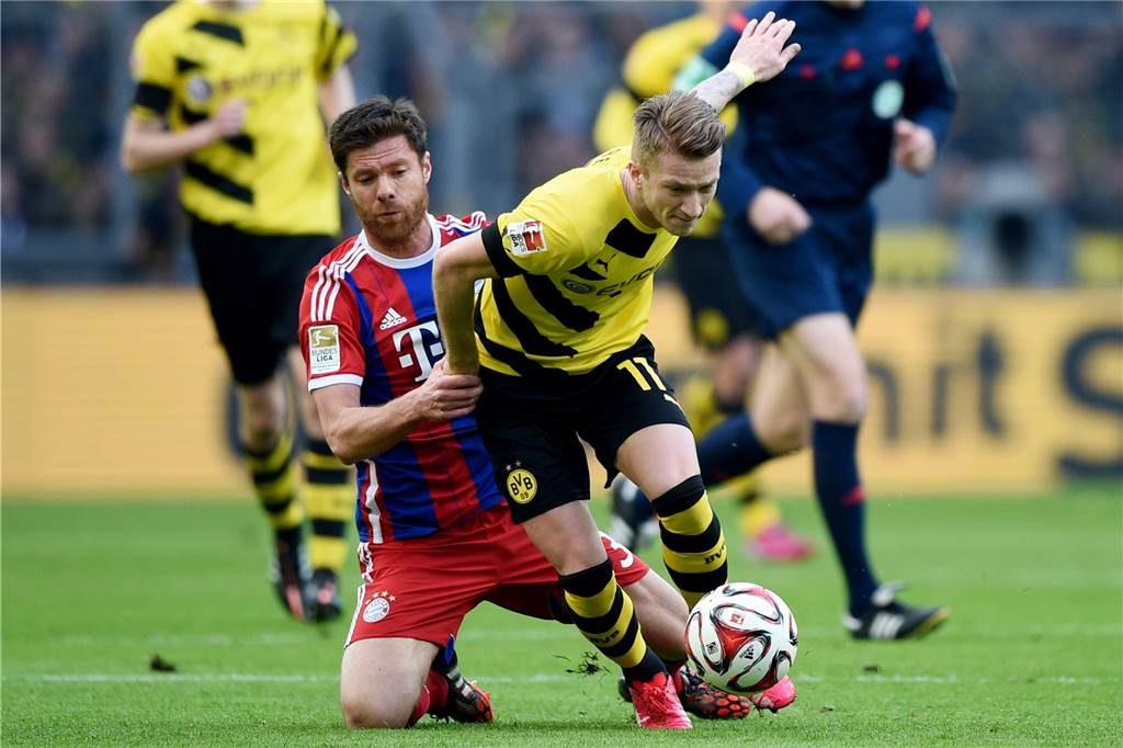 Rose wechselt zum BVB – Gladbach soll namhaften Nachfolger gefunden haben Bayerns Xabi Alonso (l.) im April 2015 im Zweikampf mit BVB-Kapitän Marco Reus.