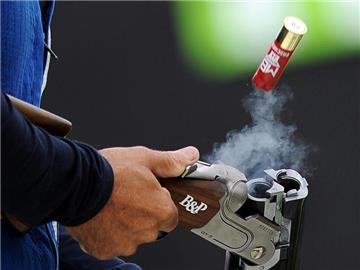 Bei der Flinte des Skeet-Schützen Ennio Falco wird die leere Patronenhülse ausgeworfen. Foto: Claudio Onorati