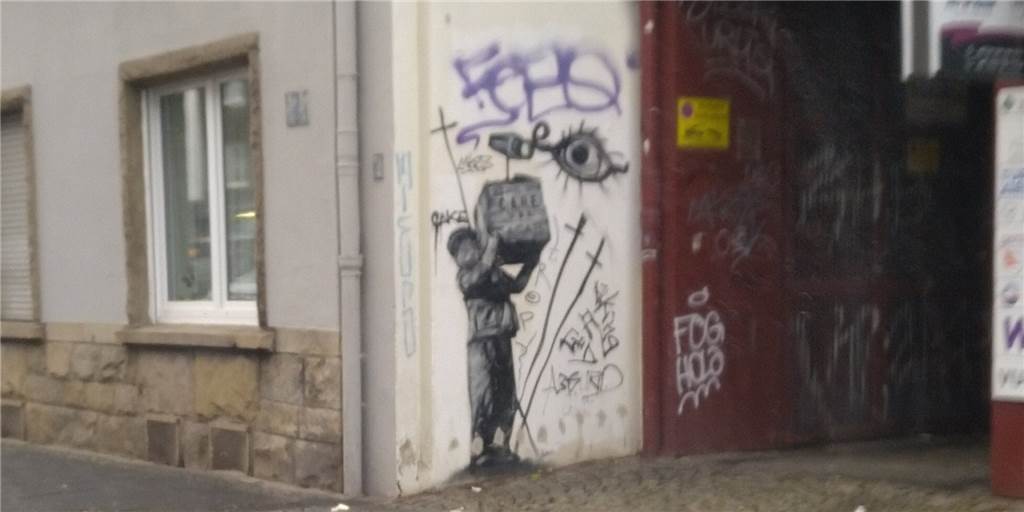Graffiti in der Mallinckrodstraße in Dortmund wirft Vermutung auf.