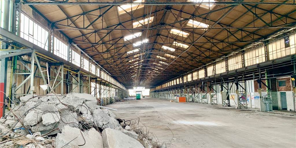 Über 300 Wohneinheiten: Startschuss auf alter Industriebrache fällt wohl 2021 In dieser Halle wurden bis 2013 Gleise hergestellt. Jetzt wird sie Teil eines Bauprojektes.