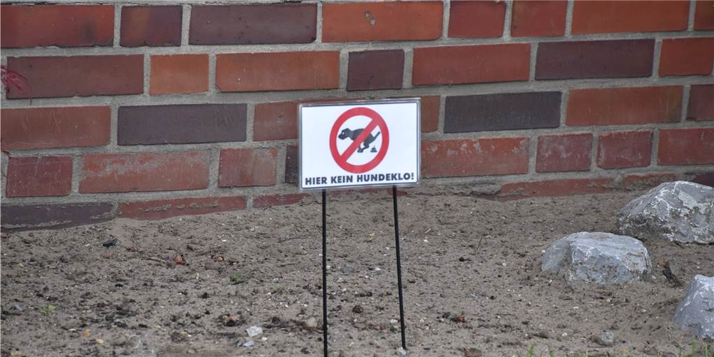 Ärger um Hundekot in Werne - Was Grundstücksbesitzer dagegen tun können Was tun, wenn Schilder nicht mehr helfen und der eigene Vorgarten zum Hundeklo wird?