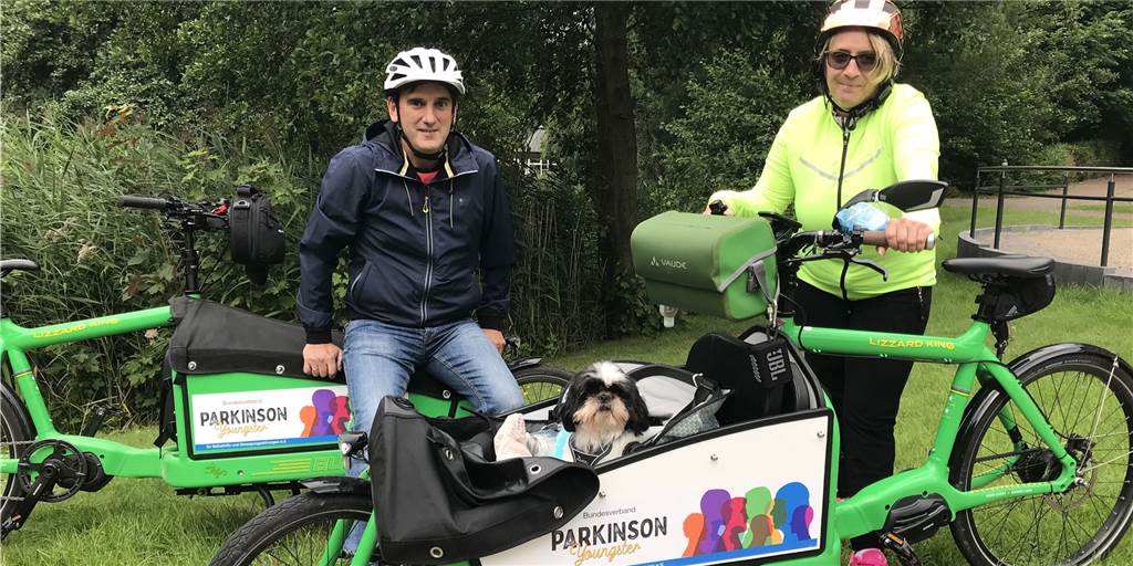 Mit dem Rad und Prominenz nach Berlin: Tour für Parkinson-Betroffene Nadine Mattes (Vorsitzende des Bundesverbands Parkinson-Youngster) und ihr Verlobter Alberto Ruibal Gonzalez (Angehörigen-Vertreter im Landesverband) organisieren die Radtour nach Berlin. Das Paar selbst nimmt mit E-Lastenrädern teil, die vom Dorstener Punta Velo-Store gestellt werden.