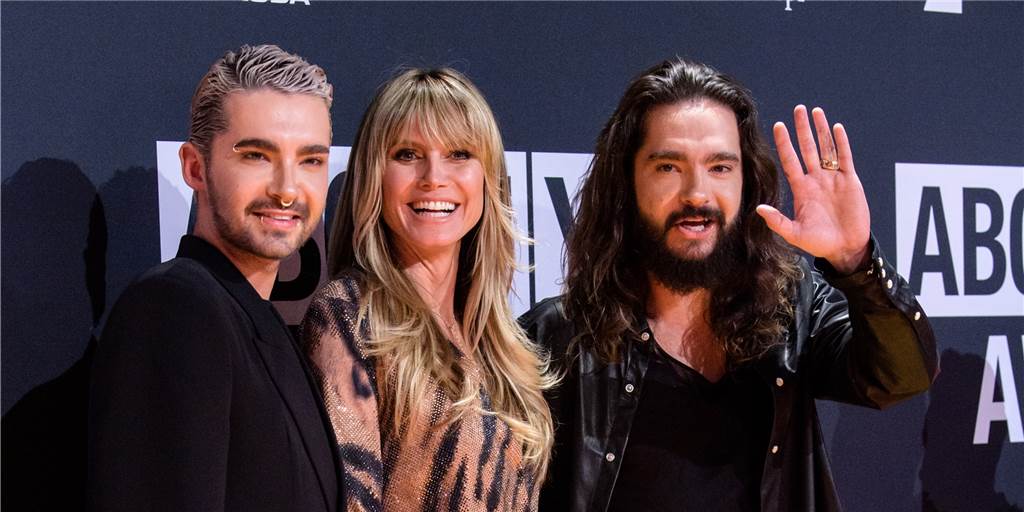 Verrückte Story! Tokio-Hotel-Star Bill Kaulitz reagiert auf Frisur von ASC-Kicker Podehl Bill Kaulitz, Sänger der Band Tokio Hotel (v.l.), Heidi Klum und ihr Ehemann Tom Kaulitz, ebenfalls Sänger der Band Tokio Hotel, kommen zur Verleihung der "About you"-Awards an die Social-Media-Persönlichkeiten des Jahres in der Bavaria-Filmstadt.