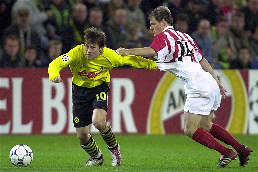 PSV Eindhoven gegen den BVB live: So sehen Sie die Champions League in TV und Stream Tomas Rosicky im Zweikampf.