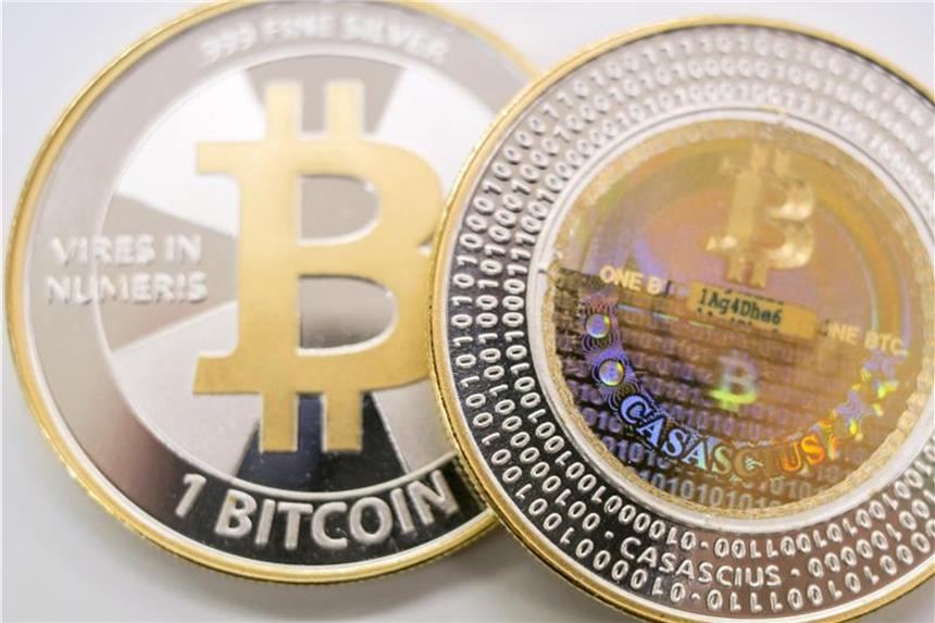 Bitcoin-Hersteller verbrauchen mehr Strom als Haushalte Bitcoin-Münzen liegen bei der Firma Bitcoin Suisse AG auf einem Tisch. Foto: Illustration