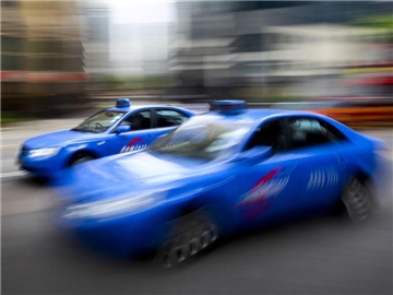 Blaue Taxis in Singapur. Foto: Stephen Morrison