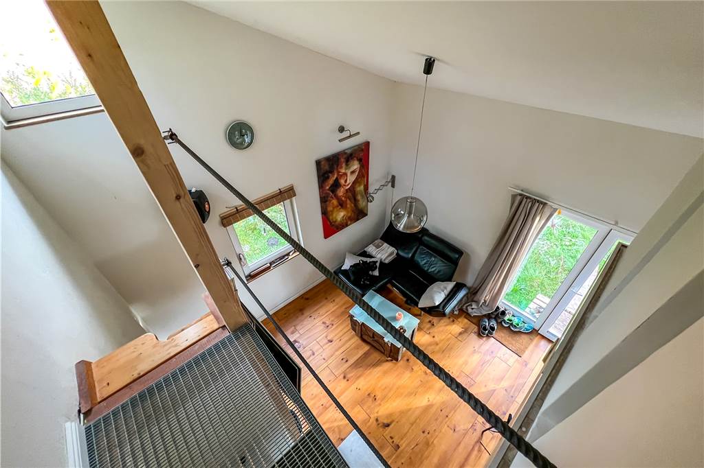 Wohnen auf 28 Quadratmetern – im eigenen Tiny House Ein eingerichtetes Wohnzimmer