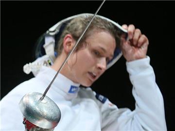 Britta heidemann muss mit dem Degenteam der Frauen bei der WM in die Trostrunde. Foto: Sergei Ilnitsky