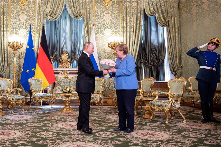 Russland-Ukraine-Konflikt: Welche Rolle übernimmt Merkel? Bundeskanzlerin Angela Merkel (CDU) und der russische Präsident Wladimir Putin.