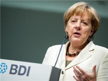 Bundeskanzlerin Angela Merkel spricht in Berlin beim «BDI-Tag der Deutschen Industrie 2014». Foto: Bernd von Jutrczenka