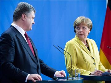 Bundeskanzlerin Angela Merkel und der Präsident der Ukraine, Petro Poroschenko im Bundeskanzleramt in Berlin. Foto: Bernd von Jutrczenka/Archiv