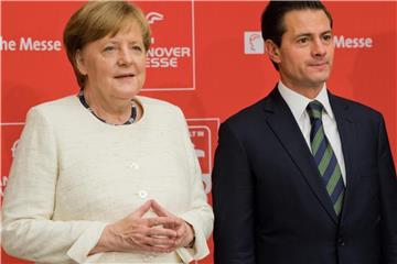 Bundeskanzlerin Angela Merkel und Mexikos Präsident Enrique Peña Nieto bei der Eröffnungsfeier der Hannover Messe. Foto: Julian Stratenschulte