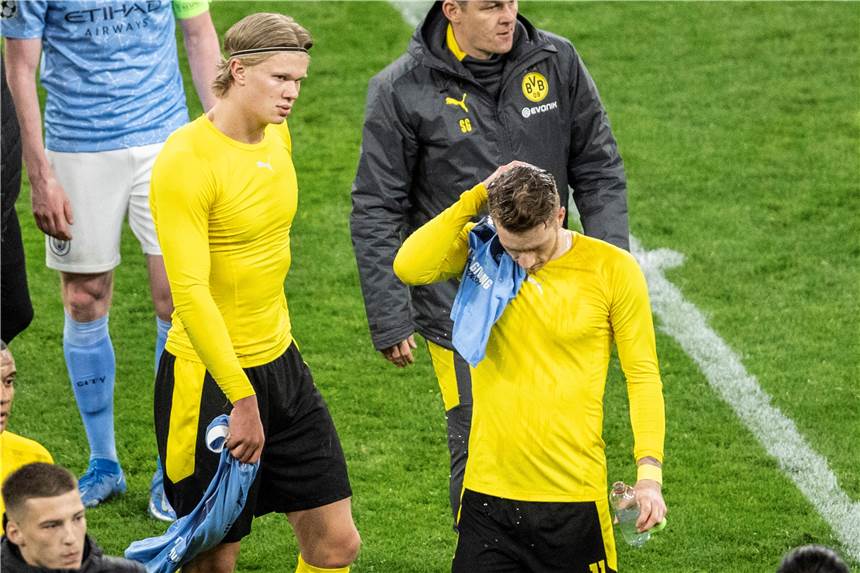 BVB-Enttäuschung nach dem Aus gegen Manchester City: Marco Reus (r.) und Erling Haaland.