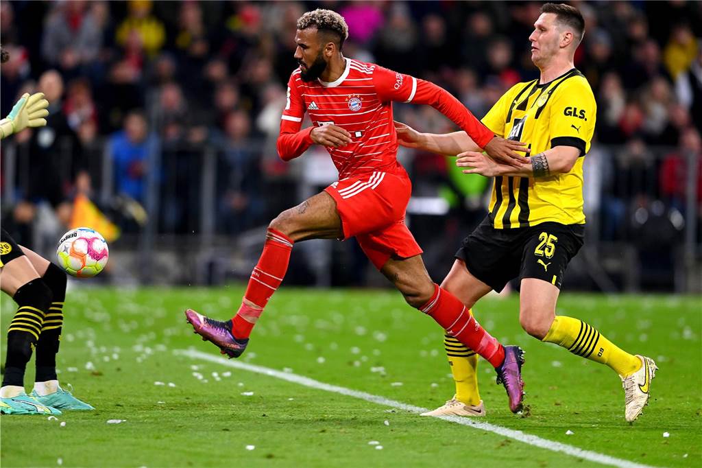 BVB-Führungsspieler? Wehrlosigkeit im Topspiel : Dortmunder Phänomen der vergangenen Jahre Niklas Süle im Zweikampf mit Eric Maxim Choupo-Moting.