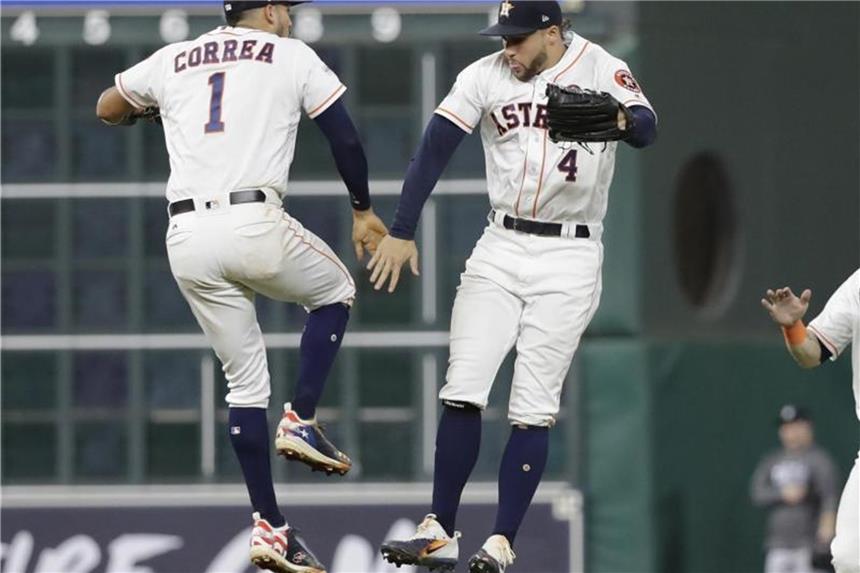 Houston Astros gewinnen zweites Spiel der World Series Carlos Correa (l) und George Springer jubeln über ihren Sieg. Foto (Archiv): David J. Phillip Foto: David J. Phillip