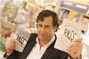 Christian Schenk bei seiner Buchlesung in Rostock. Foto: Danny Gohlke
