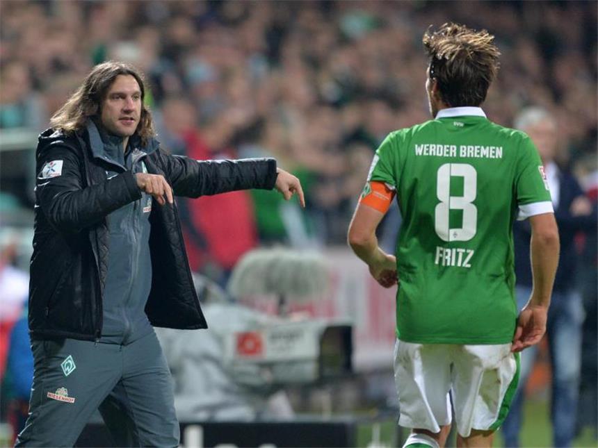Werder-Kapitän Fritz erwartet extrem motivierte Darmstädter Da waren sie noch im selben Verein: Torsten Frings (damals Werder-Co-Trainer) und Clemens Fritz. Foto: Carmen Jaspersen