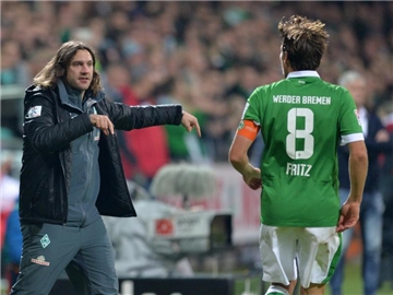 Da waren sie noch im selben Verein: Torsten Frings (damals Werder-Co-Trainer) und Clemens Fritz. Foto: Carmen Jaspersen