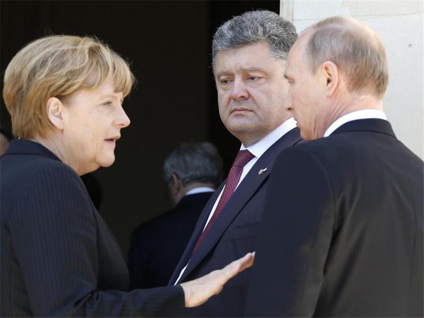 Minsk-Gipfel soll Waffenruhe für Ukraine bringen Das entscheidende Treffen findet erst im weißrussischen Minsk statt. Foto: Regis Duvignau / Pool
