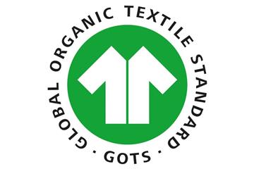 Das Label GOTS (Global Organic Textile Standard) gehört zu den Öko-Textilsiegeln, die Greenpeace als verlässlich bewertet. Foto: Internationaler Verband der Naturtextilwirtschaft