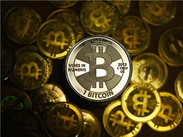 Der Bitcoin ist eine digitale Währung, die im Internet entstanden ist. Foto: Jens Kalaene