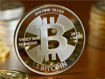 Der Bitcoin ist eine digitale Währung, die im Internet entstanden ist. Sie ist seit 2009 im Umlauf. Foto: Jens Kalaene