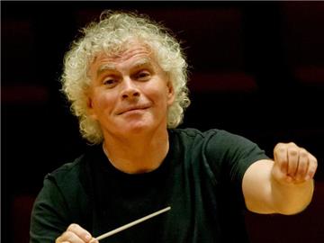 Der Dirigent der Berliner Philharmoniker, Sir Simon Rattle. Foto: Tim Brakemeier