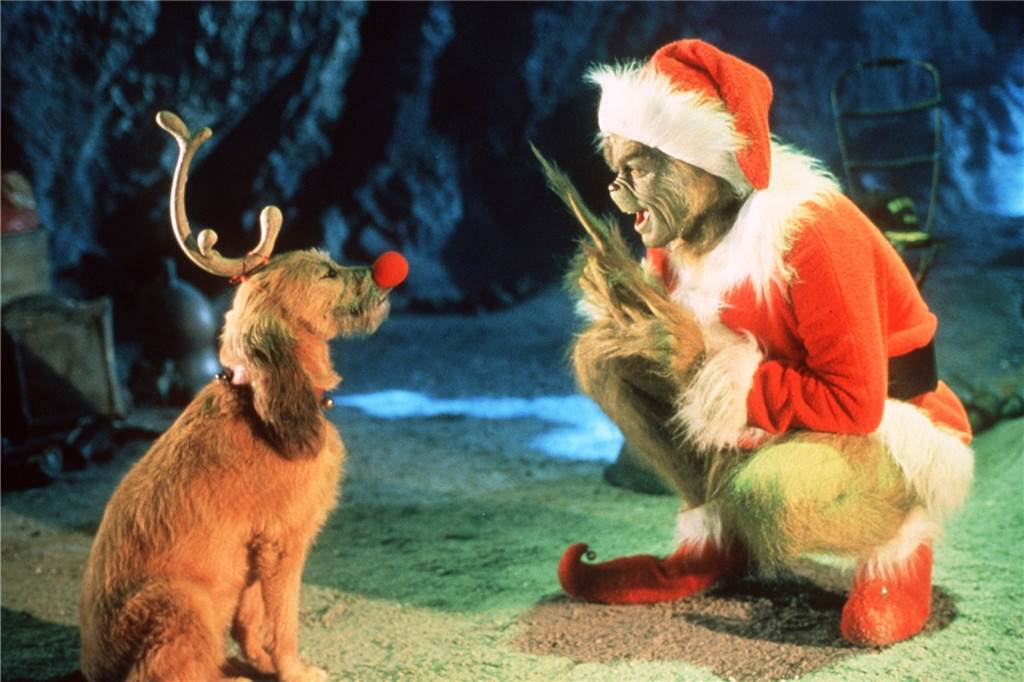 Festtagsfernsehen 2022: Von „Sissi“ bis „Kevin - Allein zu Haus“ - Das läuft an Weihnachten im TV Der hinterlistige Grinch (Jim Carrey) spricht in dem neuen Kinofilm "Der Grinch" zu seinem treuen Hund Max (Szenenfoto).