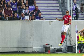 Der Mainzer Robin Quaison feiert seinen Treffer zum 2:0. Foto: Robert Michael