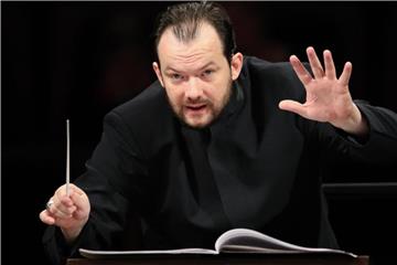Der neue Gewandhauskapellmeister Andris Nelsons bei eienr Probe. Foto: Jan Woitas