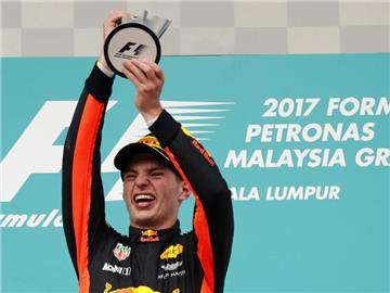 Der Niederländer Max Verstappen freut sich über seinen Sieg in Malaysia. Foto: Vincent Thian