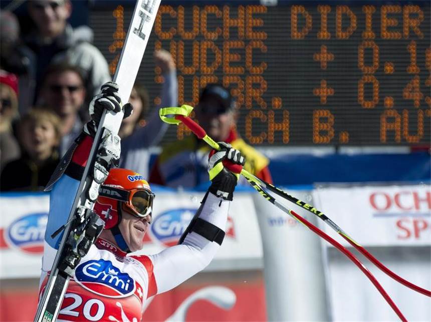 Cuche gewinnt Heim-Weltcup - Keppler an Tor vorbei Der Schweizer Didier Cuche bejubelt seinen Lauf in Crans-Montana und gewinnt den Super-G. Foto: Alessandro Della Valle