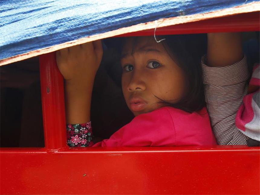 Rebellen stürmen Dörfer und Schulen in Philippinen Die Angreifer sollen Schüler als Geiseln genommen haben. Foto: Bullit Marquez/Archiv