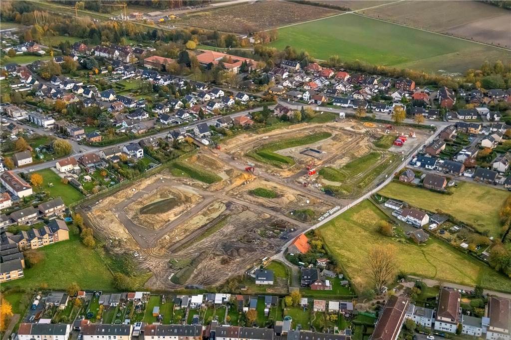 Traumhaus AG insolvent: Schock für Bauprojekt auf dem Erdbeerfeld Das Neubaugebiet "Oberaden zentral", als Erdbeerfeld bekannt, aus der Luft betrachtet.