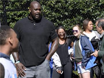 Die Basketball-Legende Shaquille O'Neal (l.) wurde von Barack Obama zum Sport-Sondergesandten der USA ernannt. Foto: Olivier Douliery