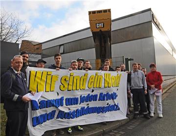 Die Belegschaft selbst organisierte am Freitagmorgen noch einmal Proteste gegen den geplanten Stellenabbau beim Bergbauzulieferer Caterpillar.