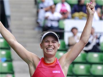Die Dänin Caroline Wozniacki bejubelt ihren Sieg beim WTA-Turnier in Tokio. Foto: Shizuo Kambayashi