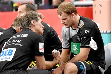 Die deutsche Handball-Nationalmannschaft muss für den Rest der EM ohne Paul Drux (r.) auskommen.