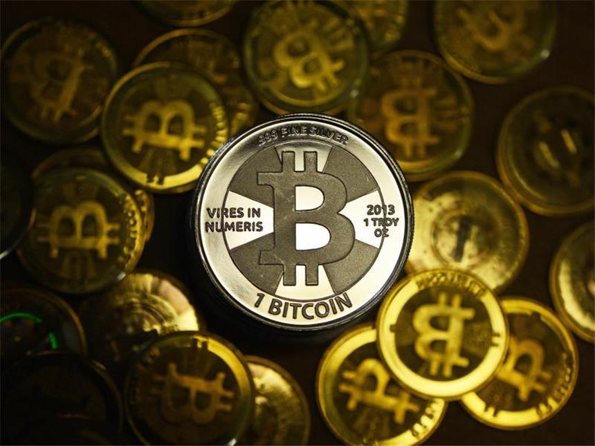 Digitalwährung Bitcoin erreicht neues Rekordhoch Die Digitalwährung Bitcoin erlebt derzeit einen rasanten Höhenflug an der Börse. Foto: Jens Kalaene